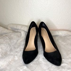 Black suede pumps